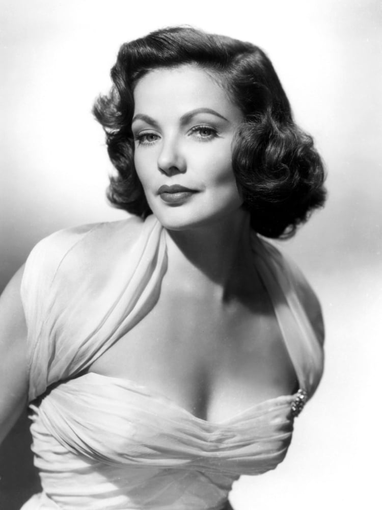 Gene Tierney photo print in a white ruffle top with sheer shoulder straps.