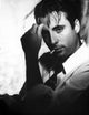 Andy Garcia smoking photo print showcasing the iconic actor's charm.