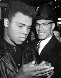 Malcolm X smiling photo print in various sizes.