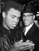 Malcolm X smiling photo print in various sizes.