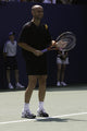 Andre Agassi tennis action photo print showcasing dynamic movement.