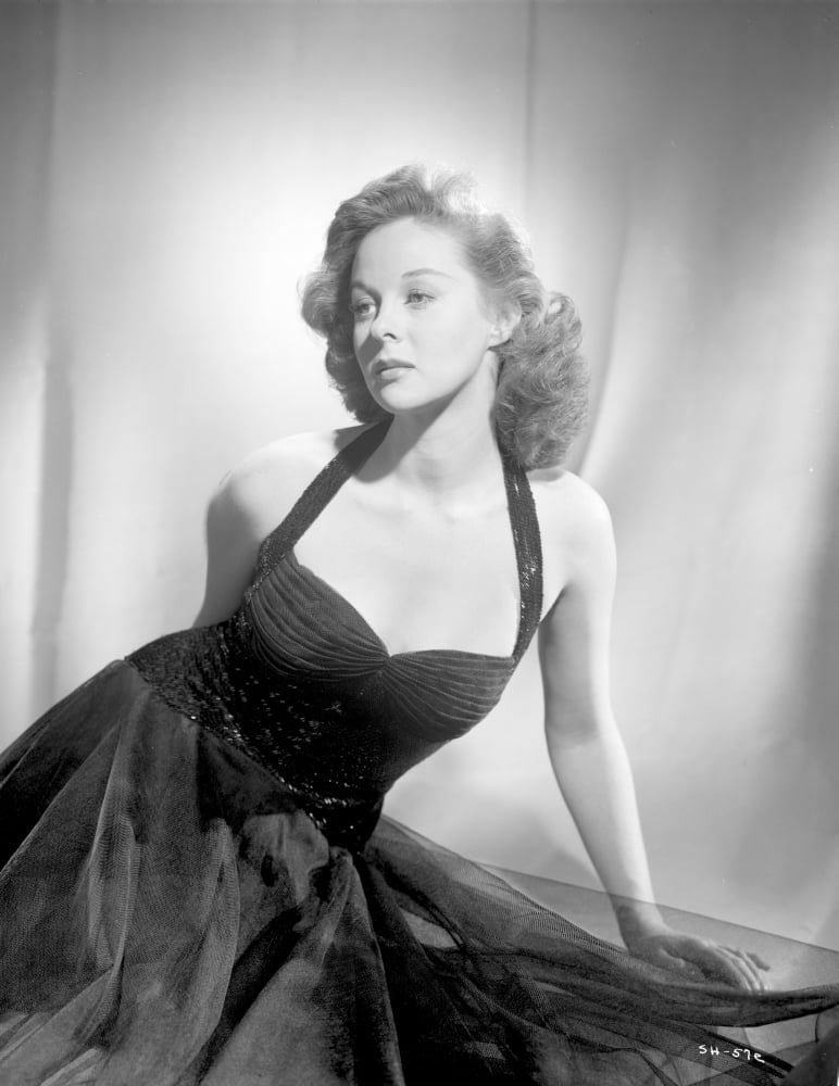 Vintage photo print of Susan Hayward in a black halter dress.