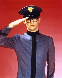Richard Thomas photo print on red background, available in multiple sizes.