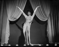 Black and white photo print of Natalie Wood spreading her hands high