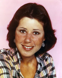 Close-up portrait photo print of Julie Kavner in checkered outfit