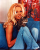 Pamela Anderson holding a cat in jeans photo print.