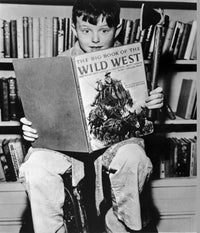 Leave It To Beaver film still photo print of a boy reading a book.