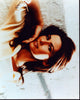 Shania Twain photo print in white with arm raised, perfect for music lovers.