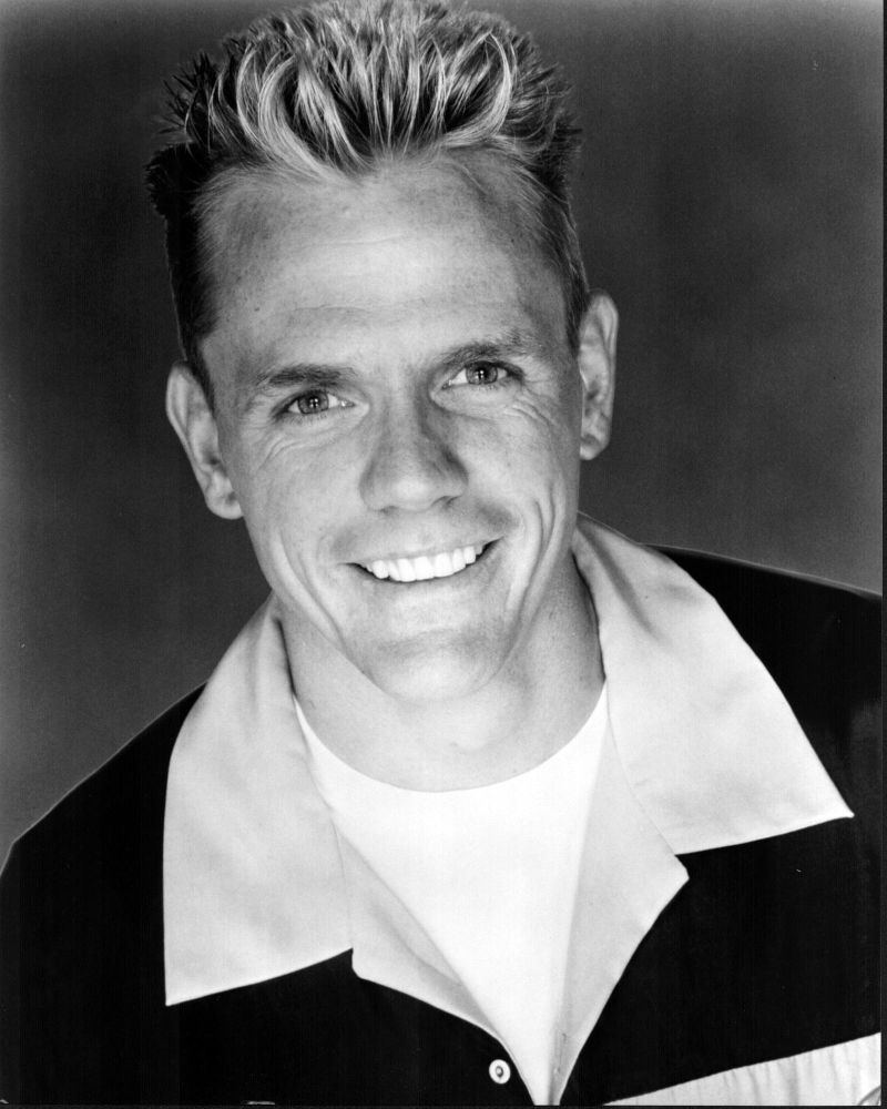 Black and white photo print of Christopher Titus in a wide collar shirt