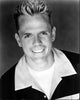 Black and white photo print of Christopher Titus in a wide collar shirt