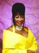 Patti LaBelle photo print in yellow gown, capturing her elegance.
