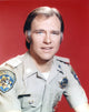 Chips character portrait in police uniform with red background photo print.