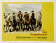 The Magnificent Seven movie poster print featuring Steve McQueen and cast.