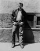 James Dean photo print in black velvet jacket and jeans leaning on wall