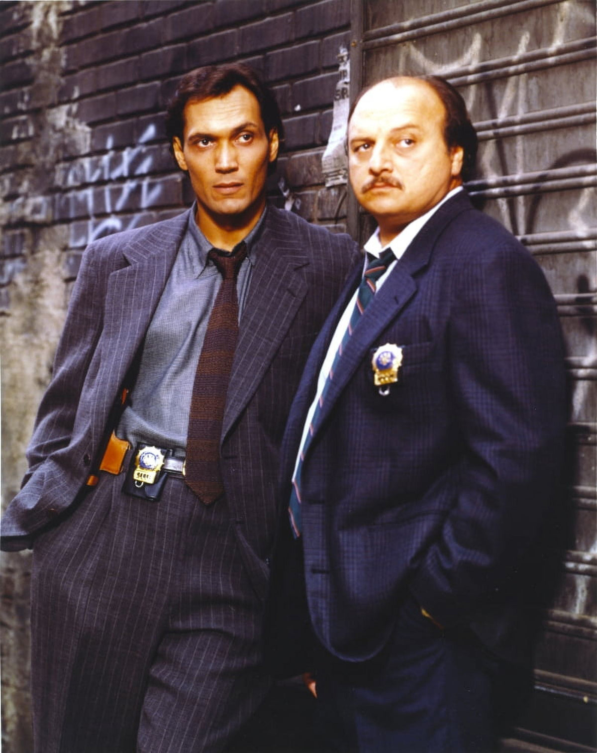 NYPD Blue standing posed in tuxedo with badge photo print.