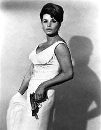 Senta Berger portrait photo print holding a gun.
