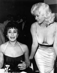 Photo print of Sophia Loren and Jayne Mansfield dining in a restaurant.