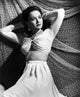 Olivia De Havilland 1941 photo print showcasing classic Hollywood elegance.