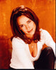 Jennifer Love Hewitt photo print in white top with orange background