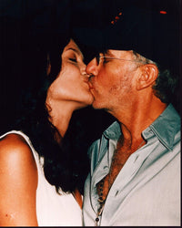 Close-up photo print of Angelina Jolie and Billy Bob Thornton kissing.