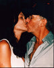 Close-up photo print of Angelina Jolie and Billy Bob Thornton kissing.