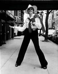 Liza Minnelli wearing a trilby on a sidewalk photo print