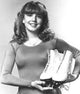 Dana Plato ice skating photo print, available in multiple sizes.
