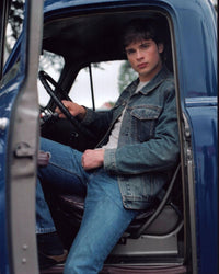Tom Welling sitting inside truck photo print.