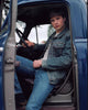 Tom Welling sitting inside truck photo print.