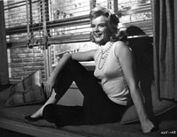 Anne Francis sitting by the window photo print