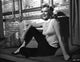 Anne Francis sitting by the window photo print