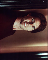 Tom Cruise leaning on wall in Vanilla Sky photo print.