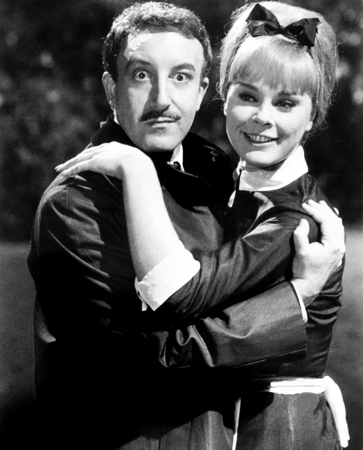 A Shot In The Dark photo poster print featuring Peter Sellers and Elke Sommer from the 1964 film.