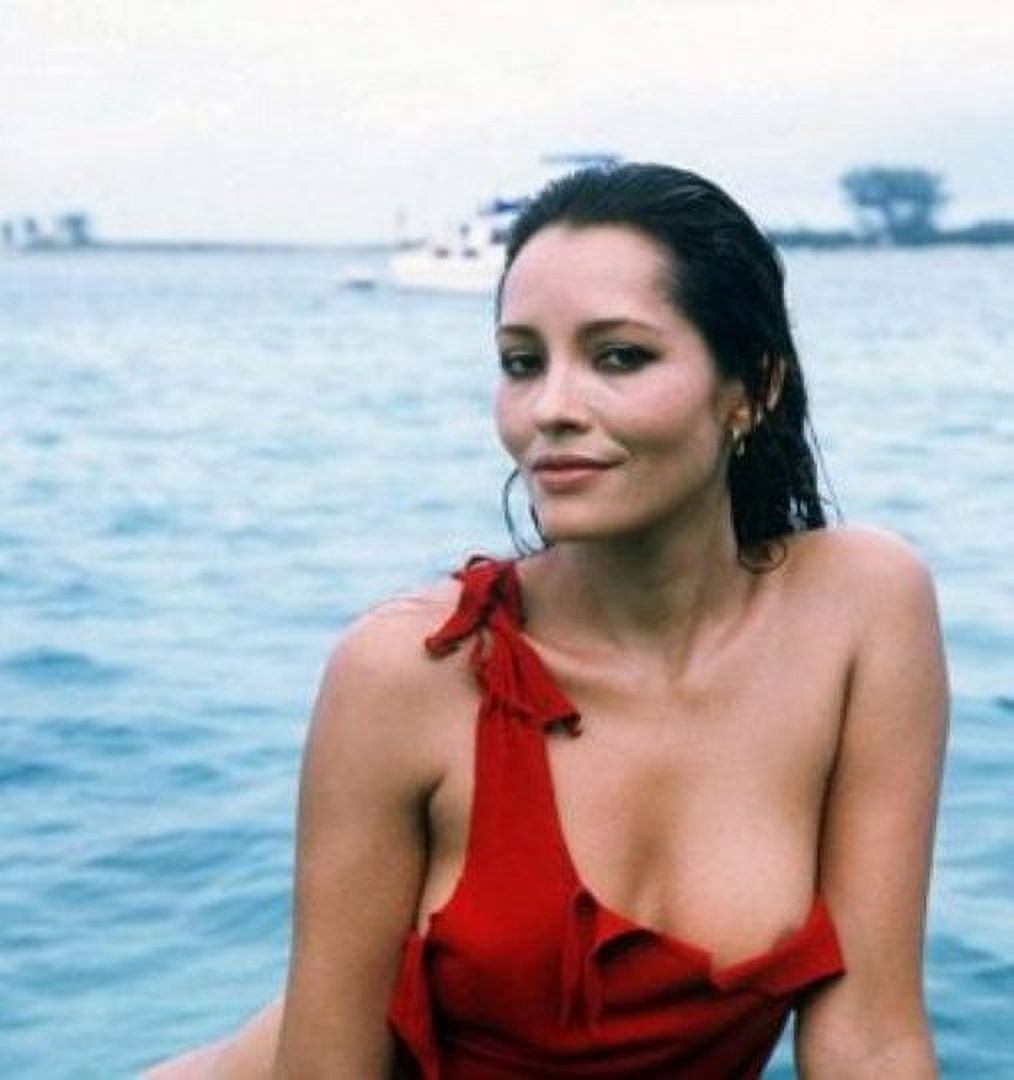 Barbara Carrera Red Outfit Photo Print in various sizes.