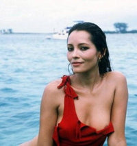 Barbara Carrera Red Outfit Photo Print in various sizes.