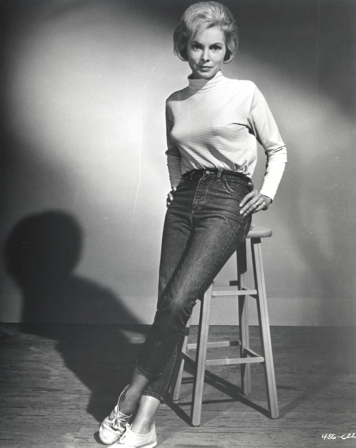 Janet Leigh photo print in elegant pose wearing white and black attire.