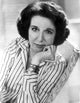 Classic photo print of Mary Wickes seated, capturing her charm and personality.