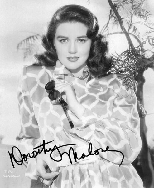 Dorothy Malone holding sunglasses photo print, classic Hollywood.