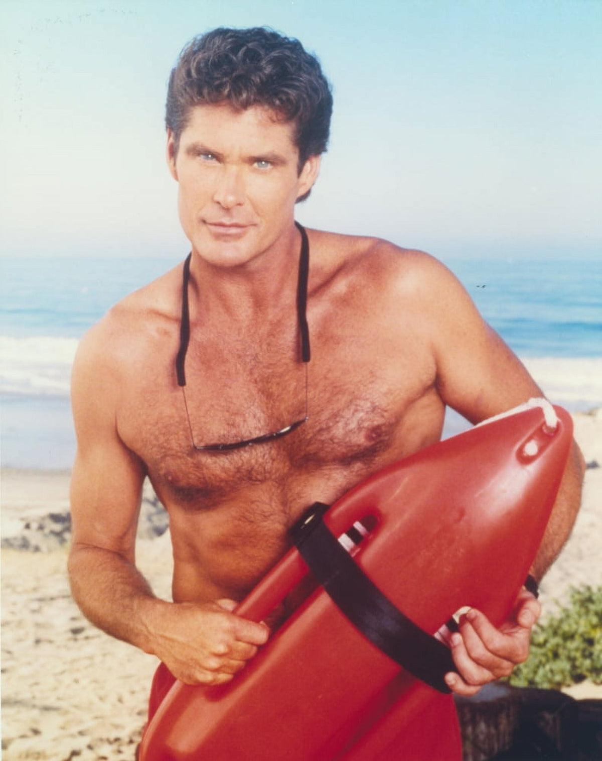 David Hasselhoff posing in a lifeguard costume photo print
