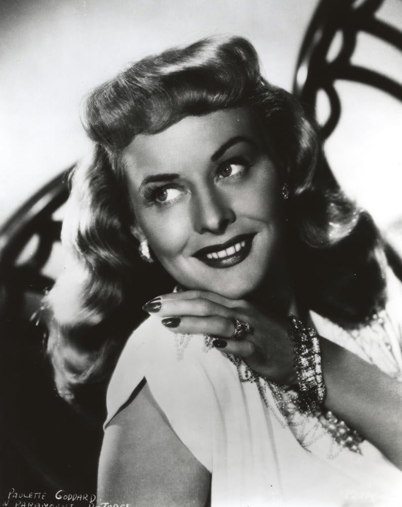 Close-up portrait photo print of Paulette Goddard in a white dress.
