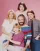 Family Ties cast portrait photo print showcasing beloved characters.