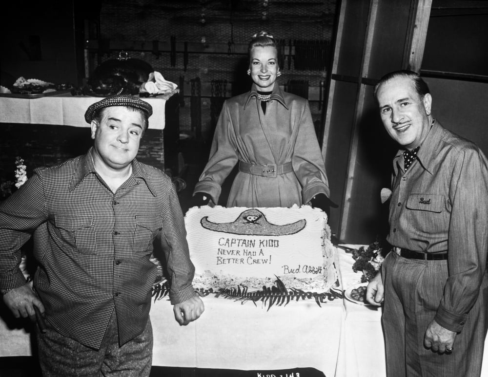 Abbott & Costello classic comedy photo print featuring the duo posed with a woman.