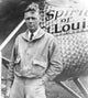 Charles Lindbergh portrait with The Spirit of St. Louis airplane print.