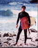Keanu Reeves surfing in wetsuit with surfboard from Point Break