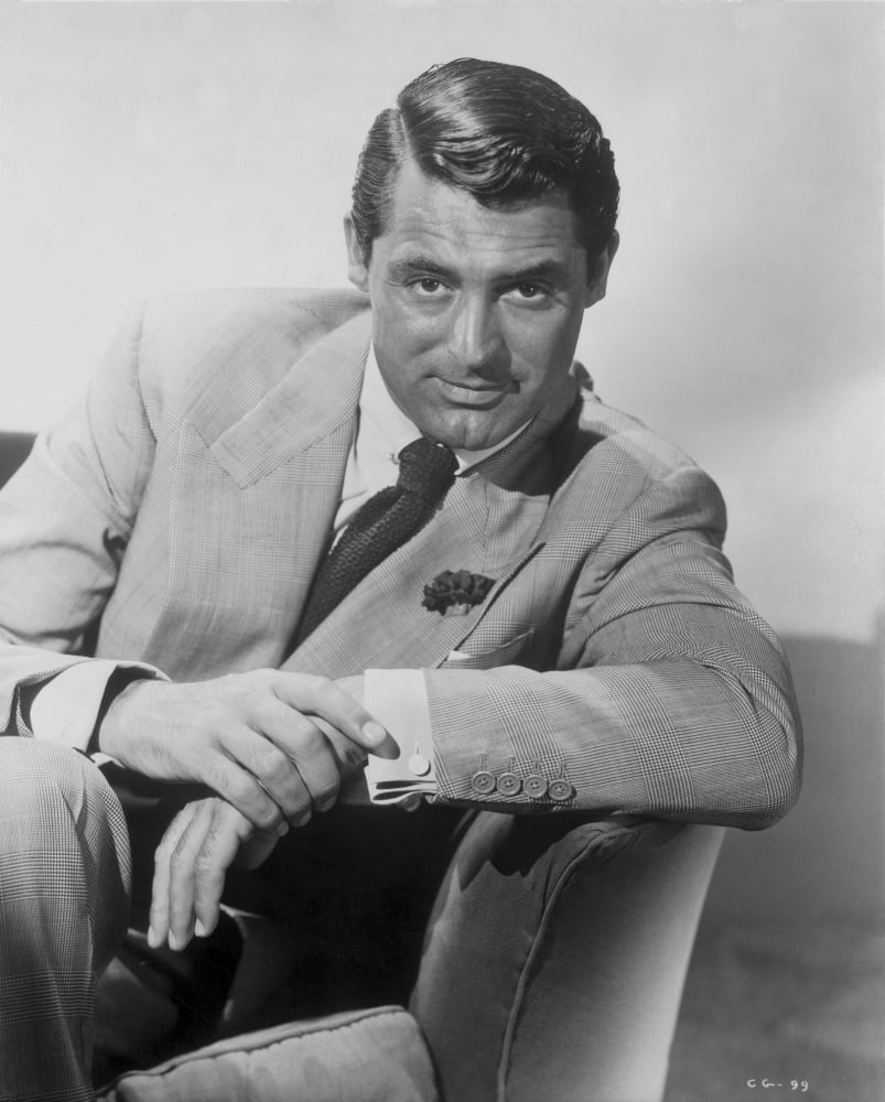Cary Grant seated in a formal suit photo print