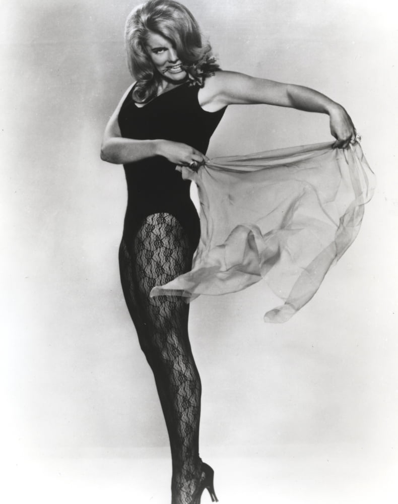 Ann-Margaret holding her blouse like a bullfighter photo print.