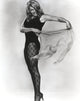 Ann-Margaret holding her blouse like a bullfighter photo print.