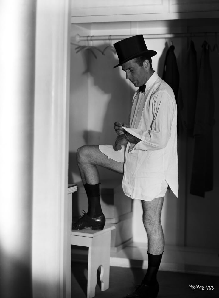 Humphrey Bogart getting dressed photo print, classic Hollywood style