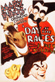 A Day At The Races movie poster featuring the Marx Brothers Groucho, Chico, and Harpo.