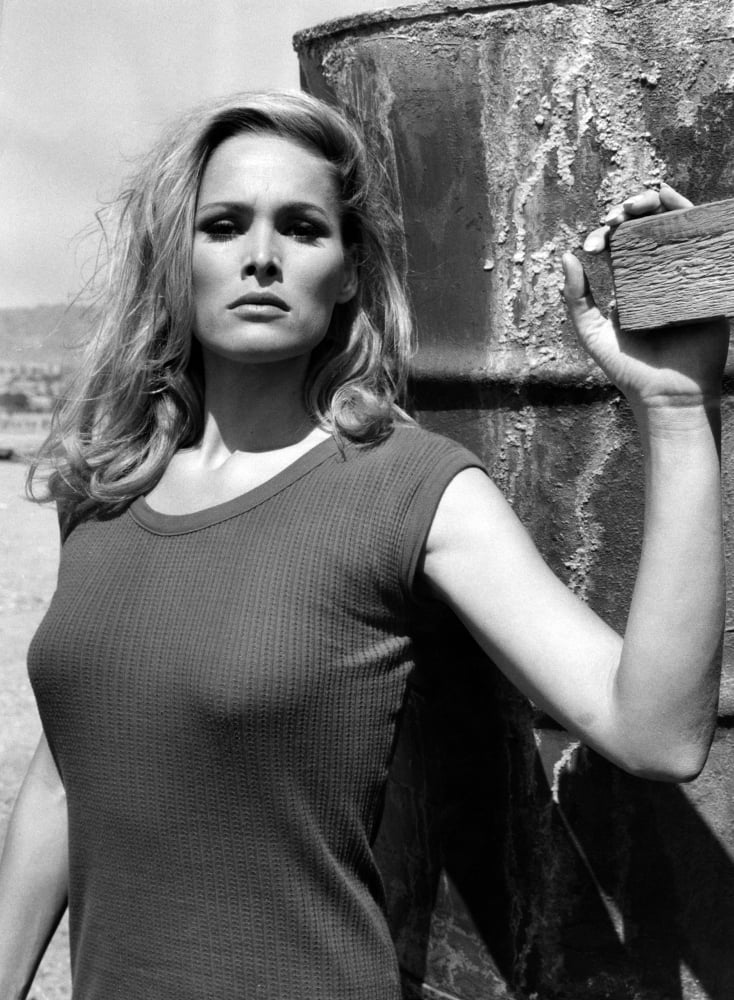 1965 photo poster print of Ursula Andress at an Israeli resort